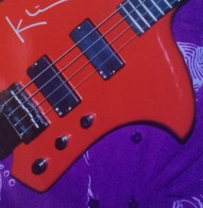 A red modern and stylish electric guitar