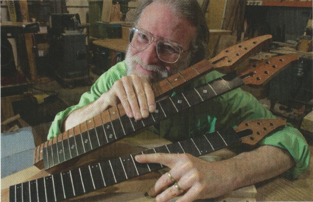 A picture of Steve Klein with his guitars