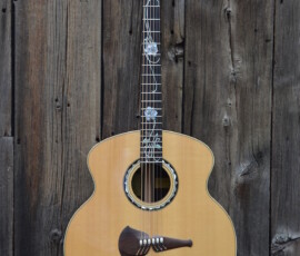 Mandolin against rustic wooden background.
