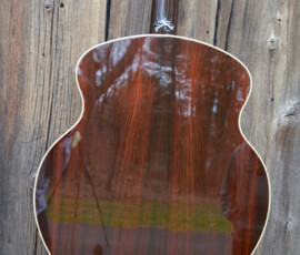 Guitar back with wood grain finish.