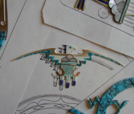 Inlay design of a stylized bird.