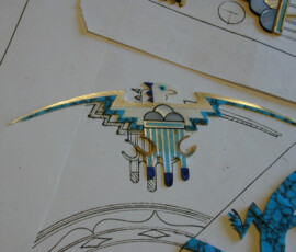 Stylized bird design on paper.