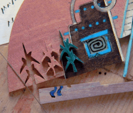 Abstract wooden shapes with intricate designs.