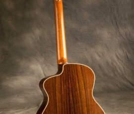 Glossy rosewood acoustic guitar back with cutaway