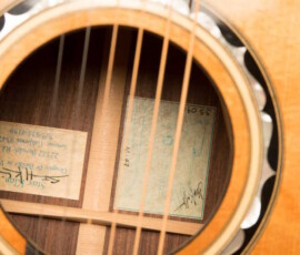 Guitar interior label and center bracing visible