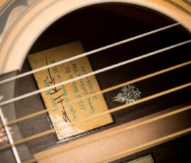 Inside view of an acoustic guitar soundhole.