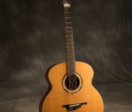 Vintage acoustic guitar with intricate rosette