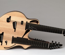 Double-neck guitar with unique body design.